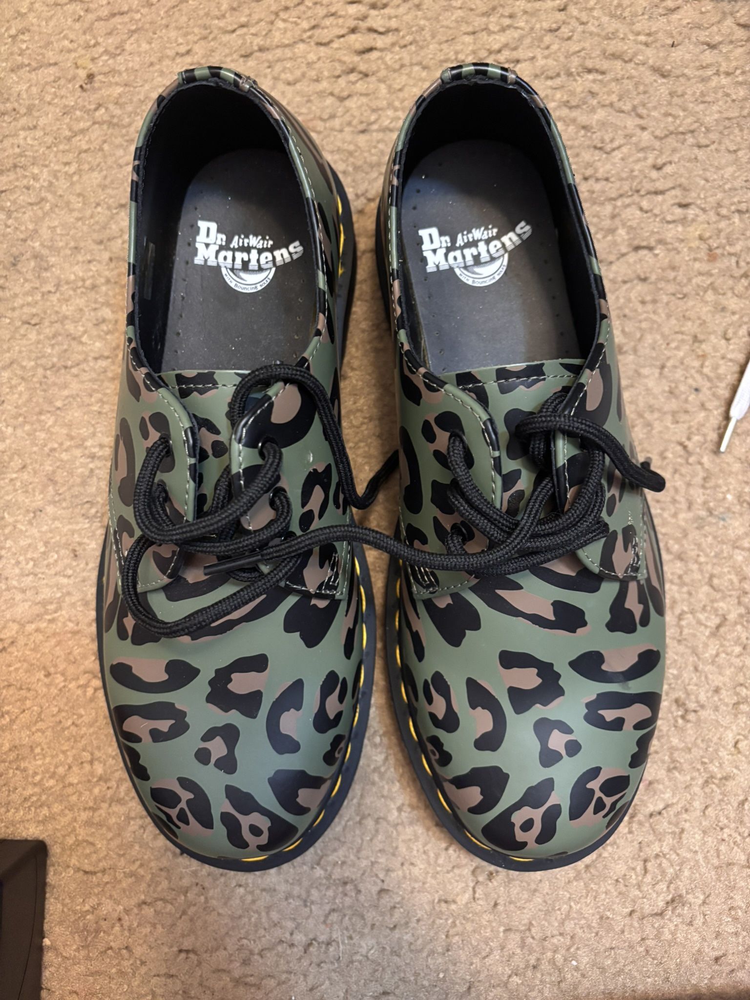 brand new unisex low doc marten w leopard print in amazing condition 