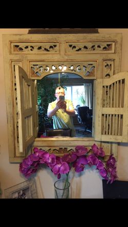 Two matching wooden mirrors