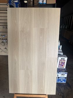 Vinyl Plank $1.69 SqFt waterproof attached pad 5.5mm Thick 20mils wear layer 23.77 SqFt per box