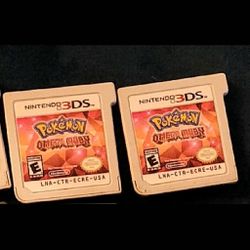 Pokemon Omega Ruby Nintendo 3DS Game Cartridges (two left)