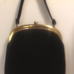 Women’s Plush handbag  with clasp opening, black felt and gold trim , 9”x10” in excellent condition.