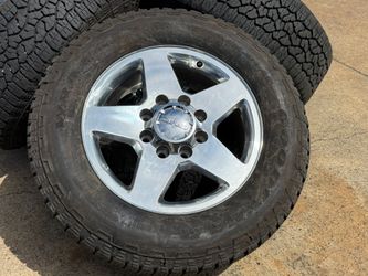 20” OEM 2018 GMC SIERRA 2500HD WHEELS POLISHED GOODYEAR AT LT275/65R20 90% LOAD E 8x180