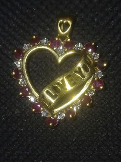 10 k heart pendant with diamonds and rubies