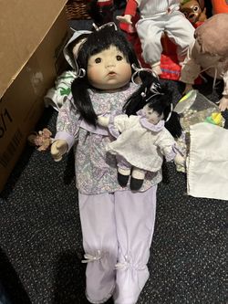 Porcelain Doll With Little Hand