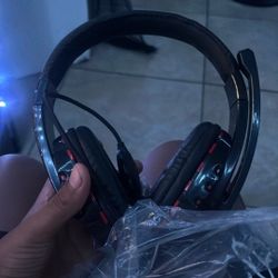 red and black headphones gaming never used