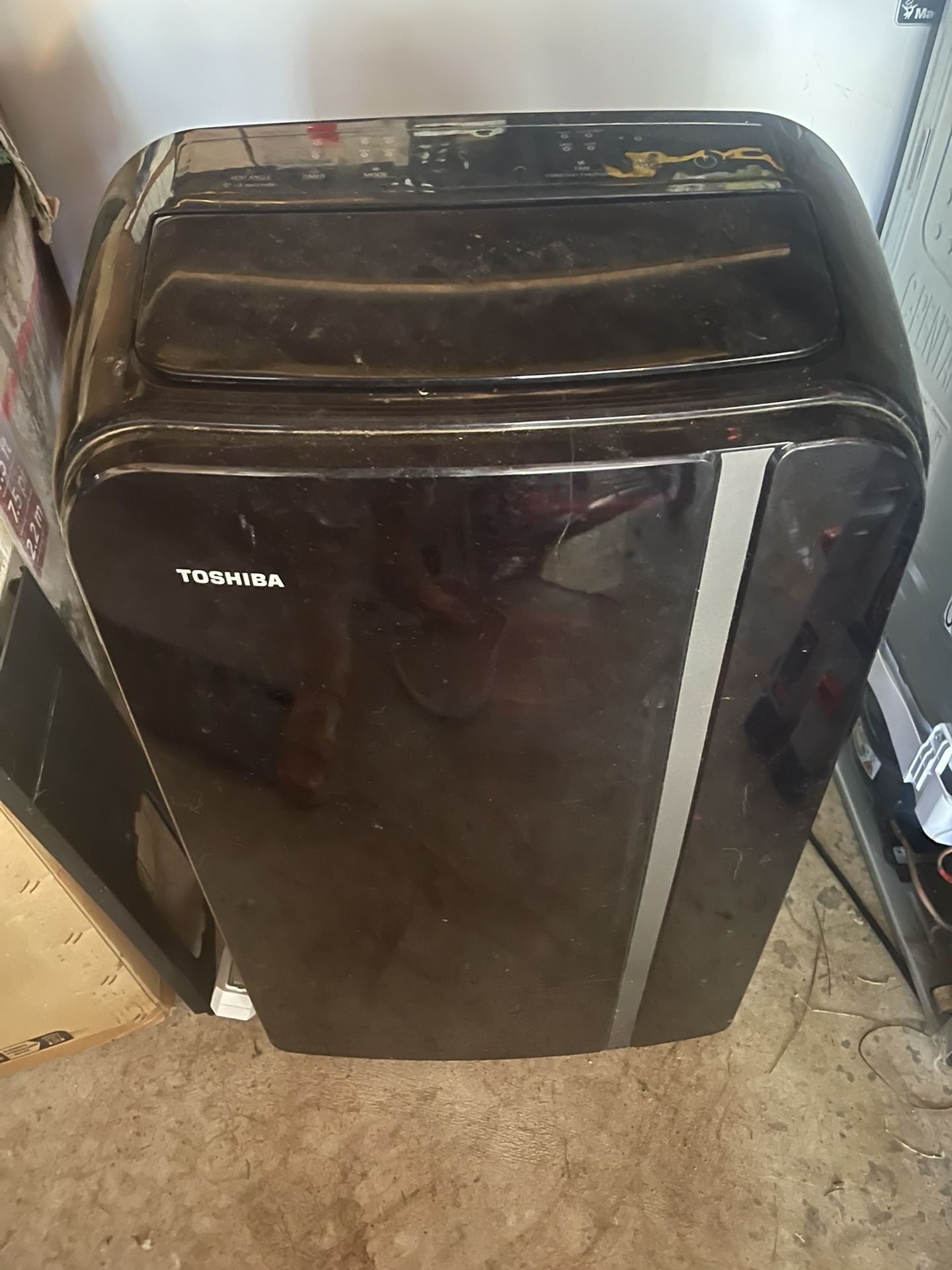 Black Toshiba AC/heater Unit