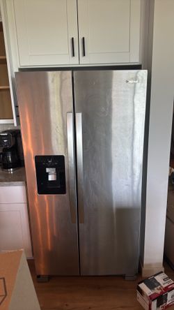 Whirlpool French door refrigerator with water and ice dispenser