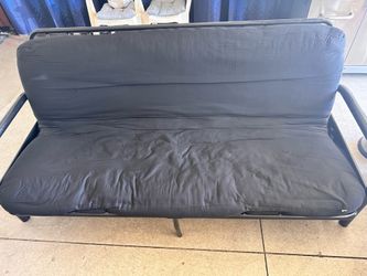 Two futons that turns into full size bed