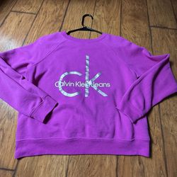 A purple Calvin Klein Jeans French Terry Logo Sweatshirt Small on tag  Very good condition  Smoke free home