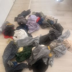 2 bags filled with mens clothes