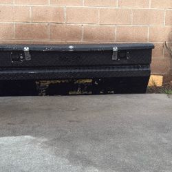 A Black Husky Aluminum Tool Box