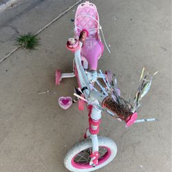   Girls bike with training wheels