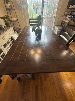 Dining table with five chairs