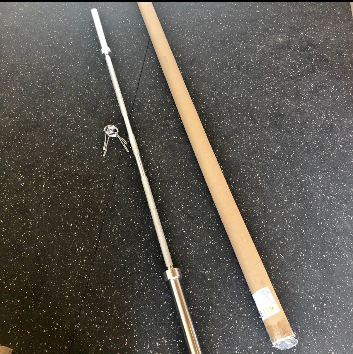 New 7 Foot Olympic Bar Still In The Box weight 45 pounds
