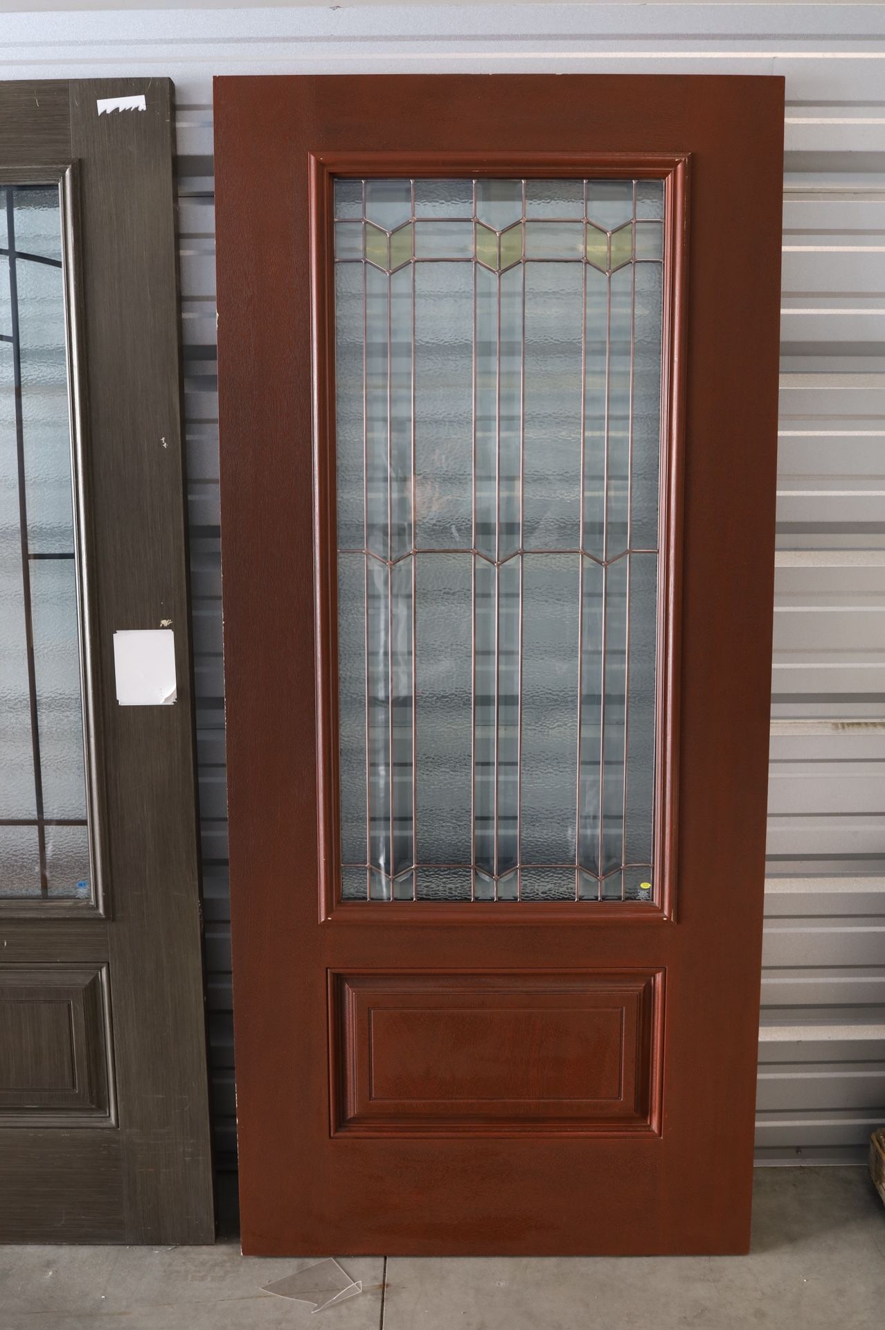 Masonite Arrowhead™ 3/4 Rectangle Bronze Caming, Slab Door