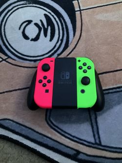 Pink And Green Joycons With Grip Holder