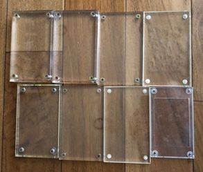 Used acrylic/plastic card protectors