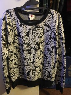 Flower print sweater. size large.
