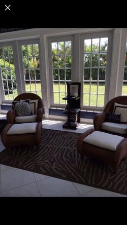 Pottery barn original. Wicker lounge chairs with ottoman