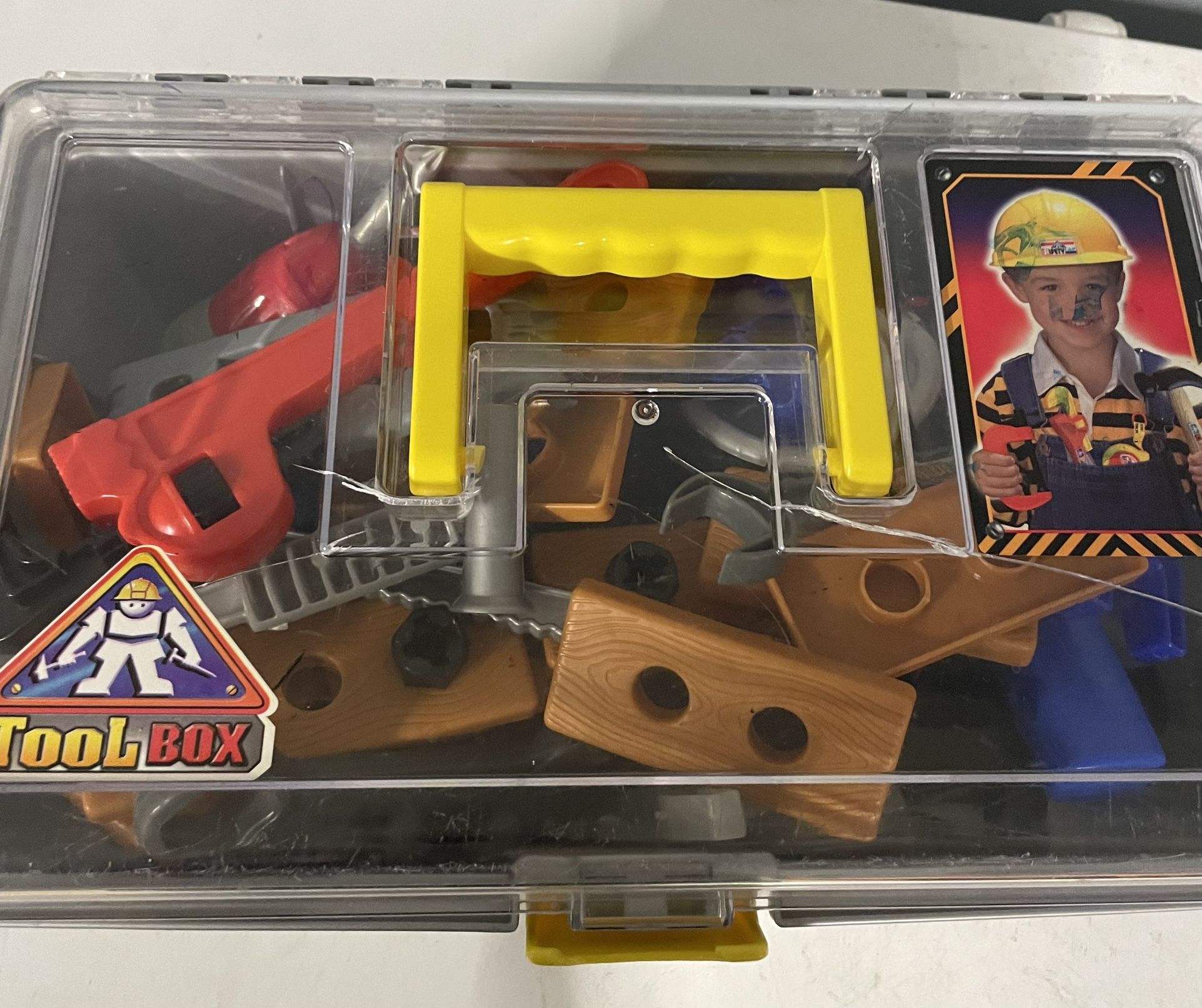 Kids, toolbox and tools