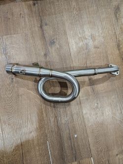 stainless steel full exhaust system header pipe designed for a Kawasaki Z125 Pro motorcycle