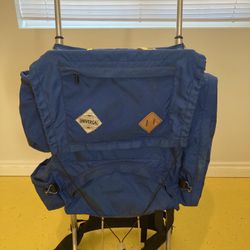 Used universal brand external frame backpack