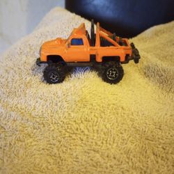 Orange Metal Stepside Vintage Toy. 