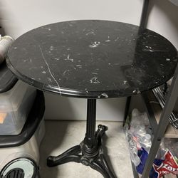 Bombay Company Black Marble Pedestal Table  29inchs Tall And 23 In Round Top. 