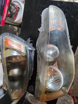 OEM Mitsubishi Lancer Headlight Assembly Pair