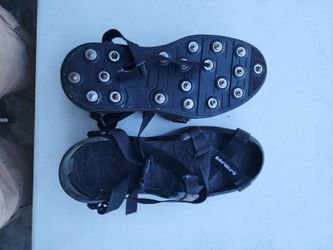 Korkers brand spiked epoxy strap on shoes