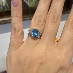 10K White Gold Blue Topaz And Natural Diamonds Ring