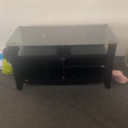 All Black. Glass Tv Stand In Good Condition 