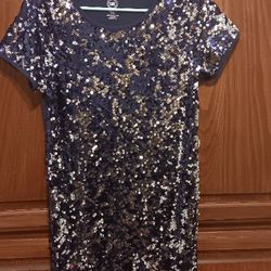 
Wonder Nation blue Silver sequin dress for girls.  Size is 2XL (18) Great For New Years