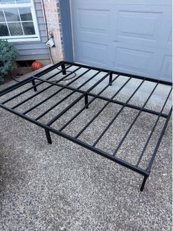 Queen bed frame (like new)