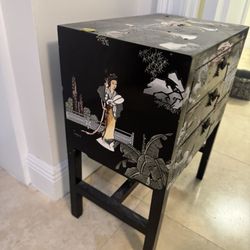Asian 3-drawer chest features a black lacquer finish with hand-painted - 17” x 11” x 22