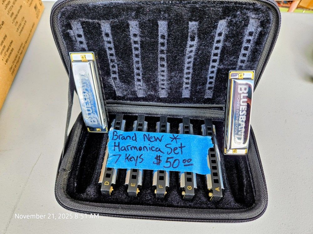 Brand new harmonica set