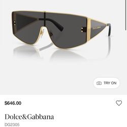 Dolce & Gabbana DG2305 shield sunglasses featuring a gold-toned metal frame with black accents