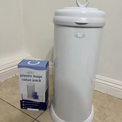 Ubbi diaper pail in great condition, like new, with around 40 bags included