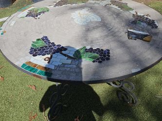 Solid concrete outdoor tables with metal base...
