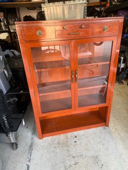 Vintage wood / glass cabinet with shelves and door
