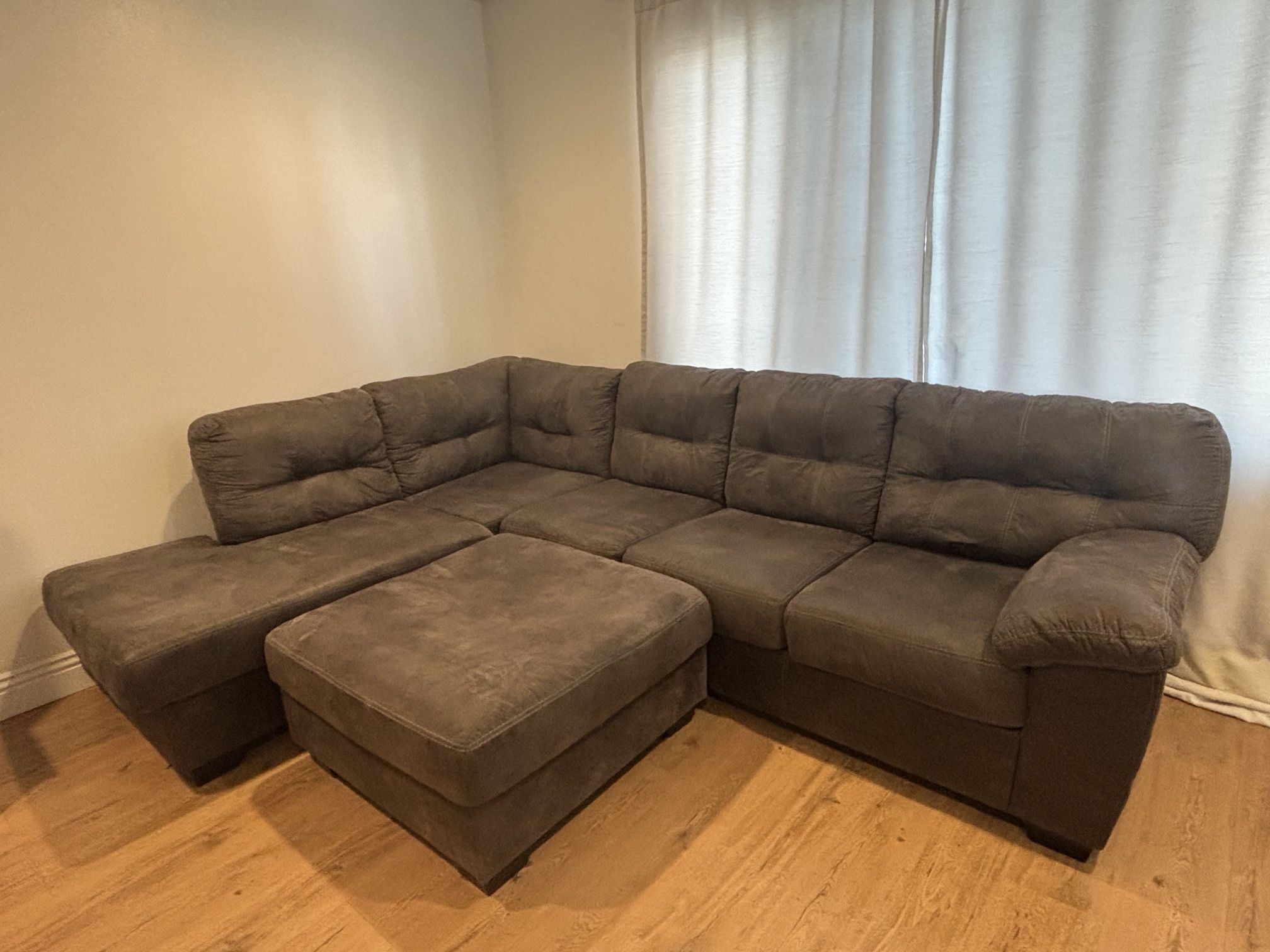 L shaped couch with ottoman