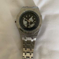 Watch with a globe design