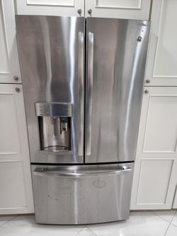 GE French Door Refrigerator With Bottom Freezer Drawer And Built In Keurig