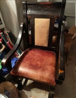 Solid wood and leather arm chair