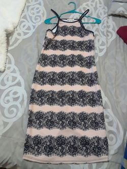 Fitted size Medium up to knee dress