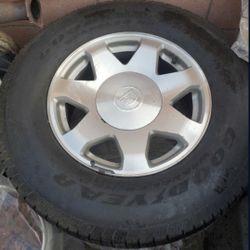 4 GoodYear tires with Cadillac rims OEM