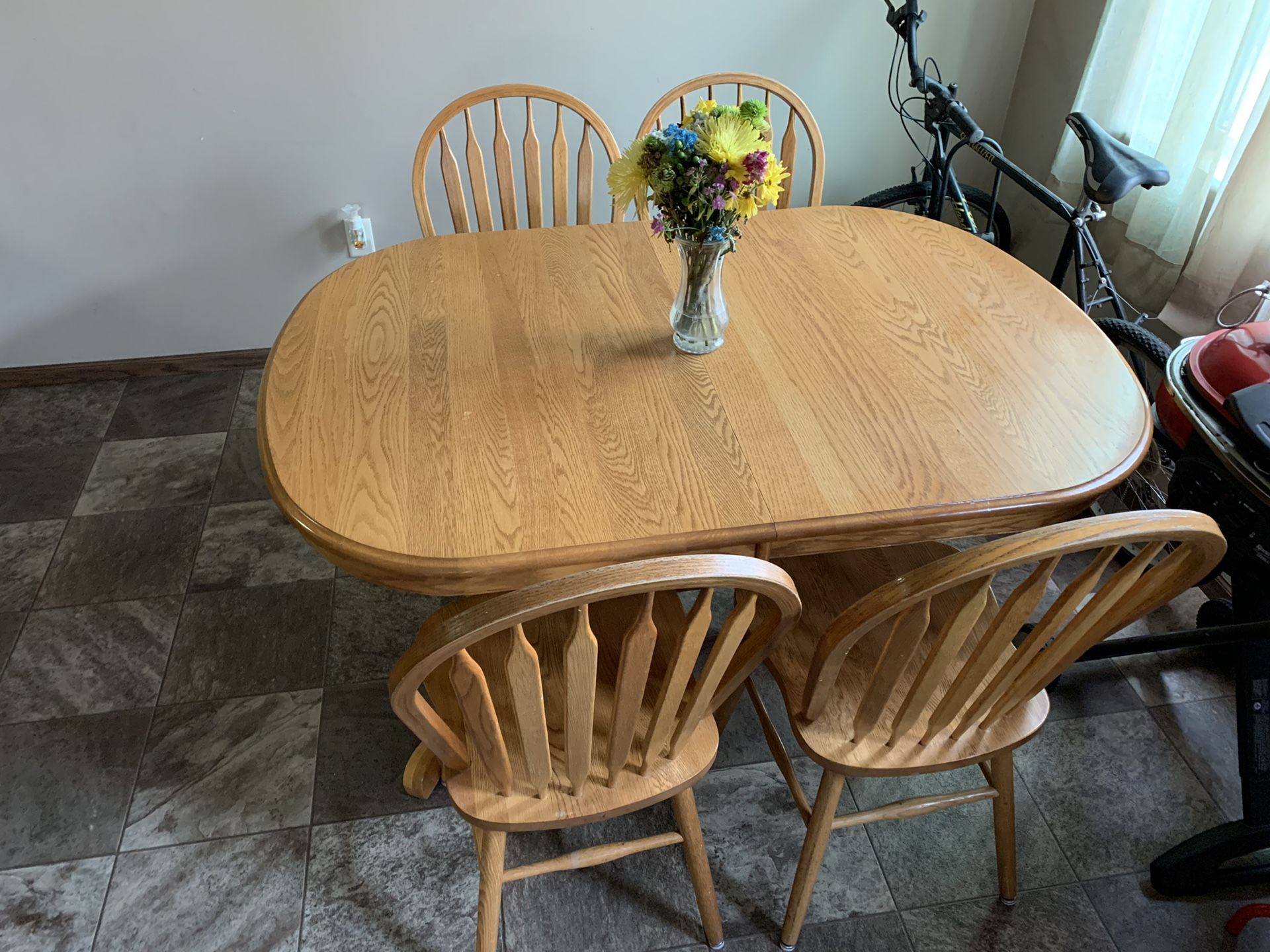 Solid Oak table with chairs and leaf