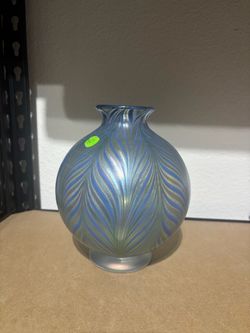 an iridescent art glass vase