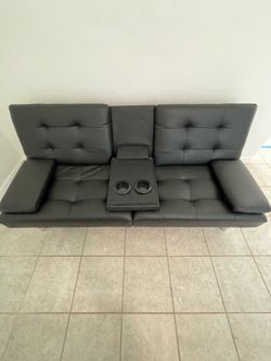 Futon with arm rest& 2 cupholders…CASH ONLY…$50 OBO