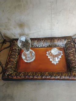 2 gorgeous glass perfume bottles.